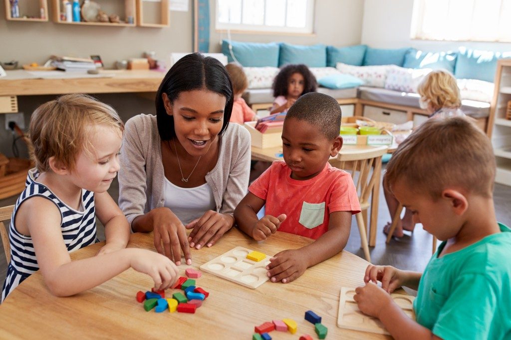 Teachers engaged in play